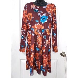 Women’s long-sleeve, floral, knee-length dress in a maroon color w/ flowers